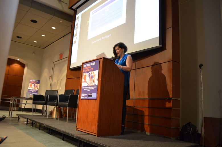 Juana Maria Rodriguez at podium at 4th JEM